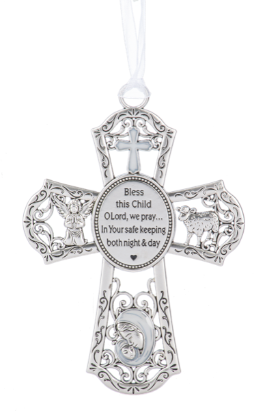 Decorative silver cross with religious text and symbols on a white background